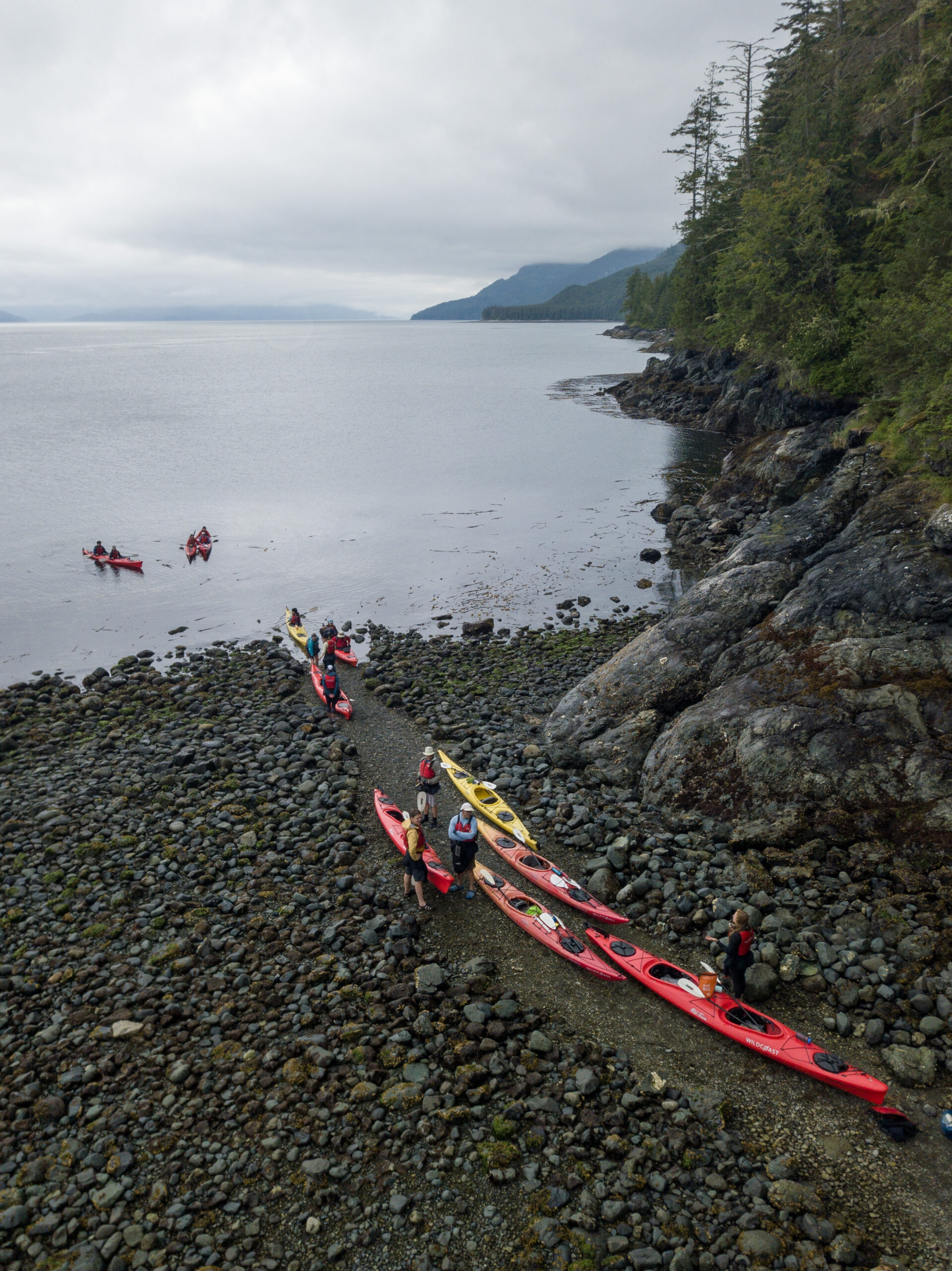 Kakays launching from the beach at Orca Camp to go for the morning paddle