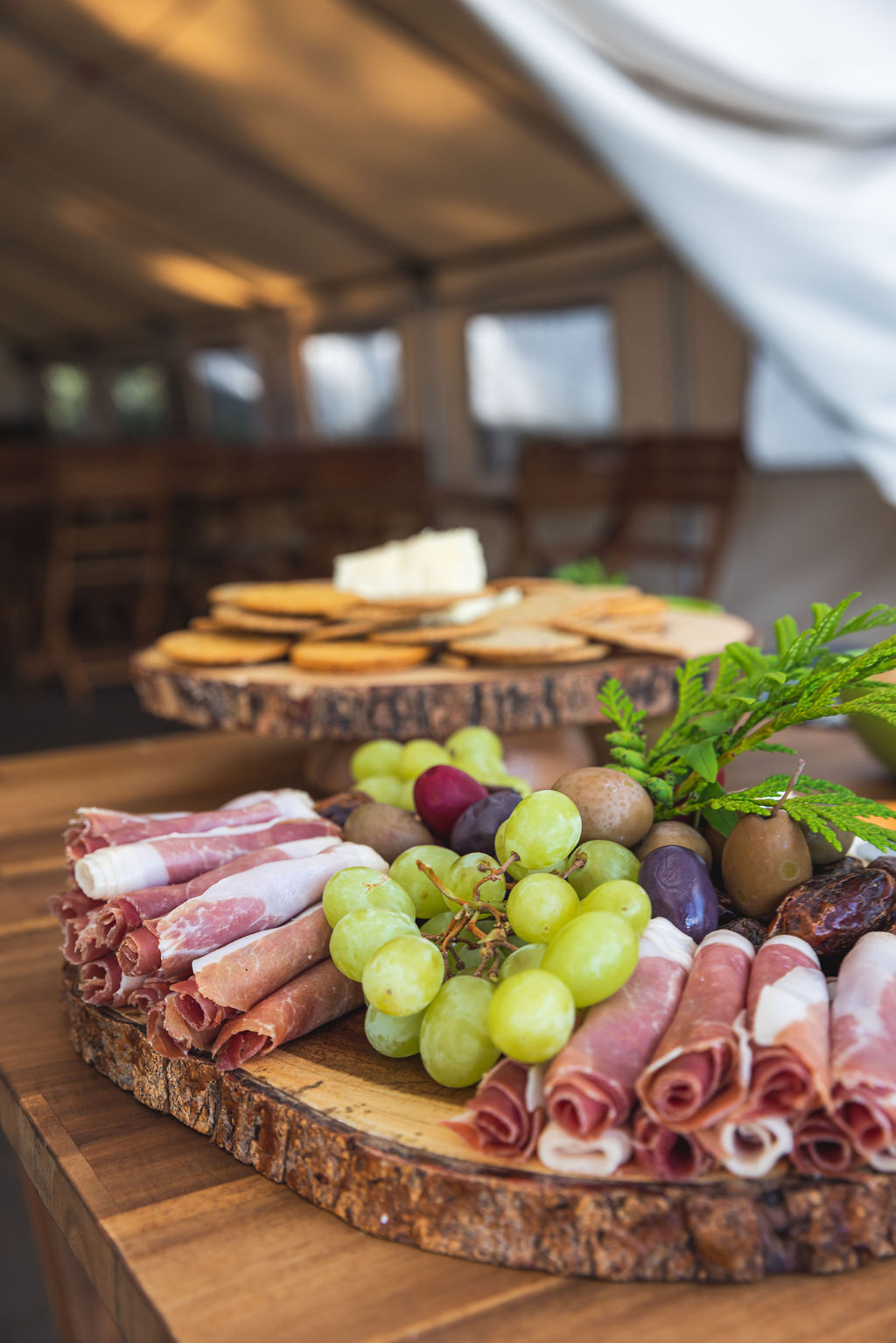 a wooden table topped with lots of different types of food